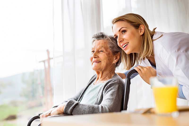 home carer with elderly woman